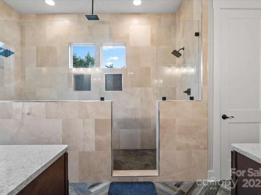 867 Bellegray Road, Clover, SC 29710.  MLS# CAR4262623, YatesRealty ID 34439. Primary extended shower big enough for the family