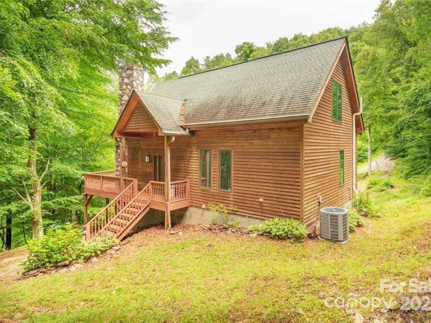 45 Wilderness Drive, Weaverville, NC 28787.  MLS# CAR4221623, YatesRealty ID 3444. 2022 Spring photo — new roof was added December 2023