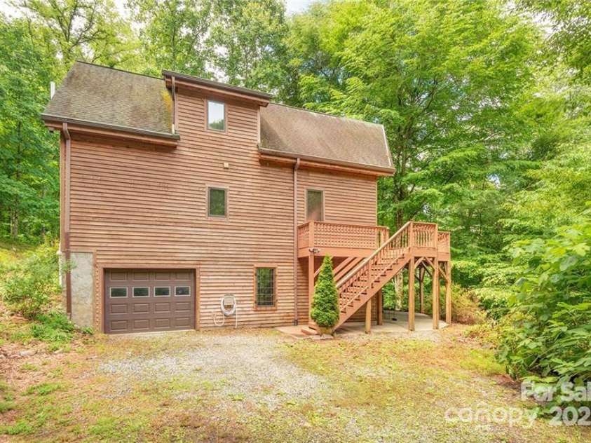 45 Wilderness Drive, Weaverville, NC 28787.  MLS# CAR4221623, YatesRealty ID 3444. 2022 Spring photo — new roof was added December 2023