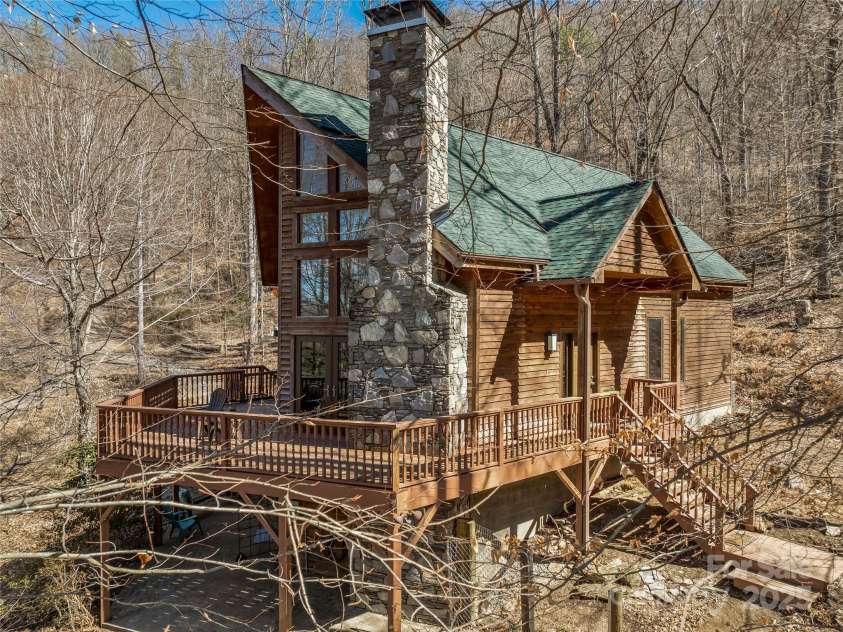 45 Wilderness Drive, Weaverville, NC 28787.  MLS# CAR4221623, YatesRealty ID 3444. A lovely mountain retreat on 4.04 acres