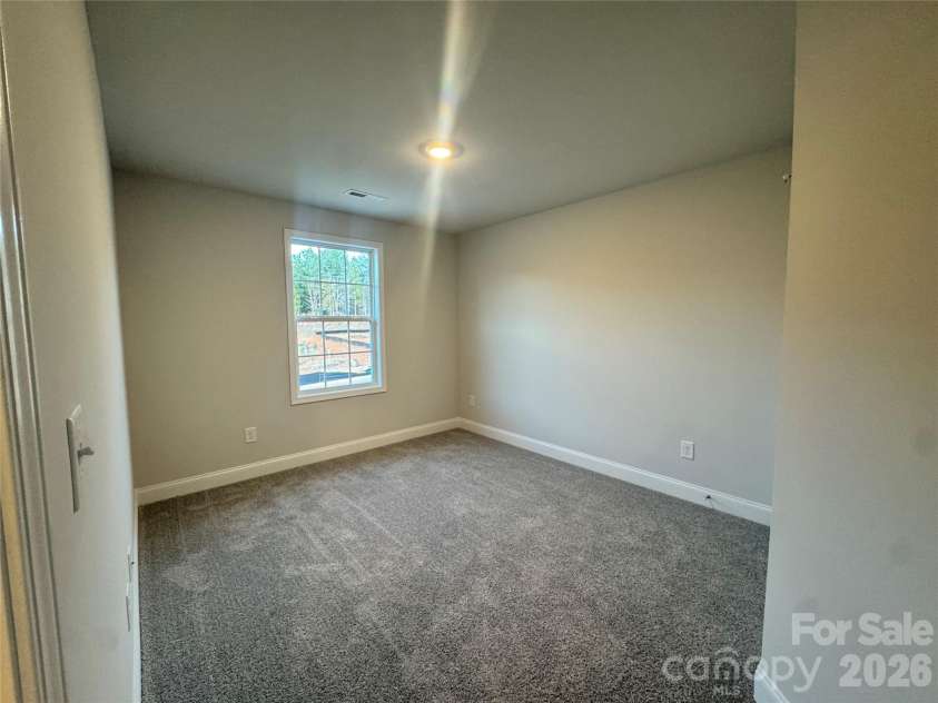 712 Inwood Hill Drive, Gastonia, NC 28056.  MLS# CAR4399206, YatesRealty ID 34440. Bedroom 1  Representative Photo