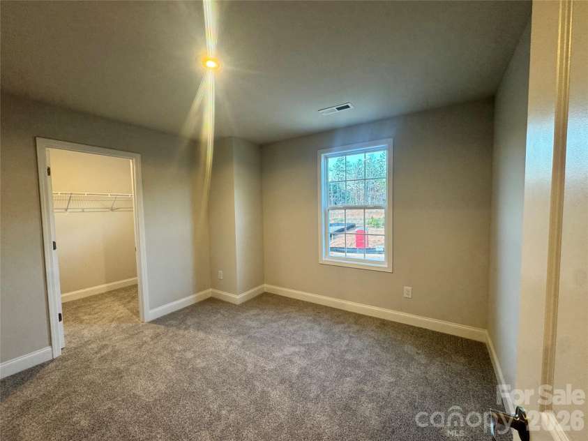 712 Inwood Hill Drive, Gastonia, NC 28056.  MLS# CAR4399206, YatesRealty ID 34440. Bedroom 2  Representative Photo
