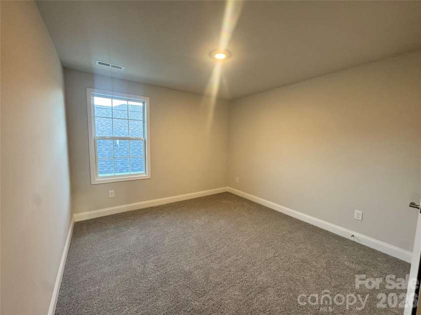 712 Inwood Hill Drive, Gastonia, NC 28056.  MLS# CAR4399206, YatesRealty ID 34440. Bedroom 3  Representative Photo