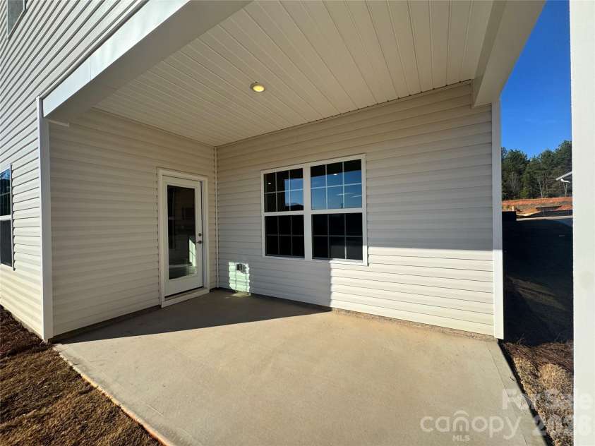712 Inwood Hill Drive, Gastonia, NC 28056.  MLS# CAR4399206, YatesRealty ID 34440. Covered lanai  Representative Photo