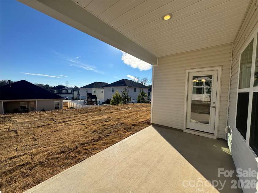 712 Inwood Hill Drive, Gastonia, NC 28056.  MLS# CAR4399206, YatesRealty ID 34440. Covered lanai  Representative Photo