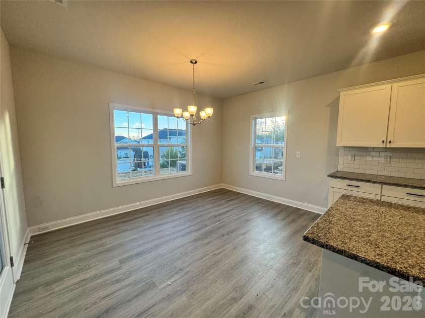 712 Inwood Hill Drive, Gastonia, NC 28056.  MLS# CAR4399206, YatesRealty ID 34440. Dining area Representative Photo