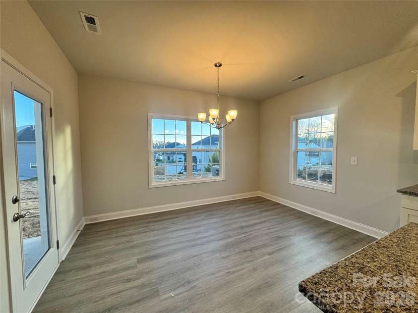 712 Inwood Hill Drive, Gastonia, NC 28056.  MLS# CAR4399206, YatesRealty ID 34440. Dining area  Representative Photo