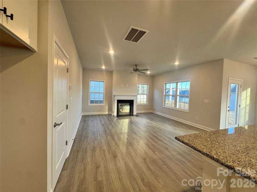 712 Inwood Hill Drive, Gastonia, NC 28056.  MLS# CAR4399206, YatesRealty ID 34440. Family room Representative Photo