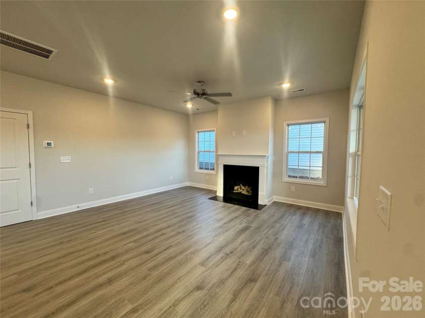 712 Inwood Hill Drive, Gastonia, NC 28056.  MLS# CAR4399206, YatesRealty ID 34440. Family room Representative Photo