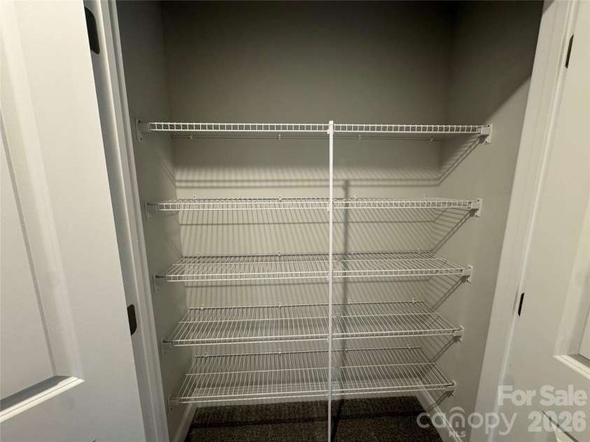 712 Inwood Hill Drive, Gastonia, NC 28056.  MLS# CAR4399206, YatesRealty ID 34440. Hall closet  Representative Photo