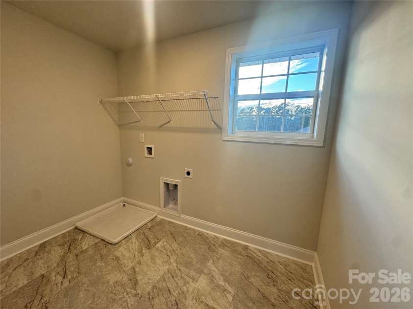 712 Inwood Hill Drive, Gastonia, NC 28056.  MLS# CAR4399206, YatesRealty ID 34440. Laundry room  Representative Photo