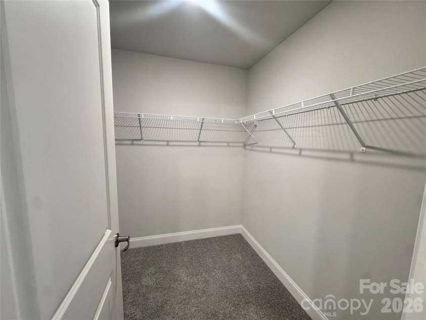 712 Inwood Hill Drive, Gastonia, NC 28056.  MLS# CAR4399206, YatesRealty ID 34440. Oversized walk-in closet  Representative Photo