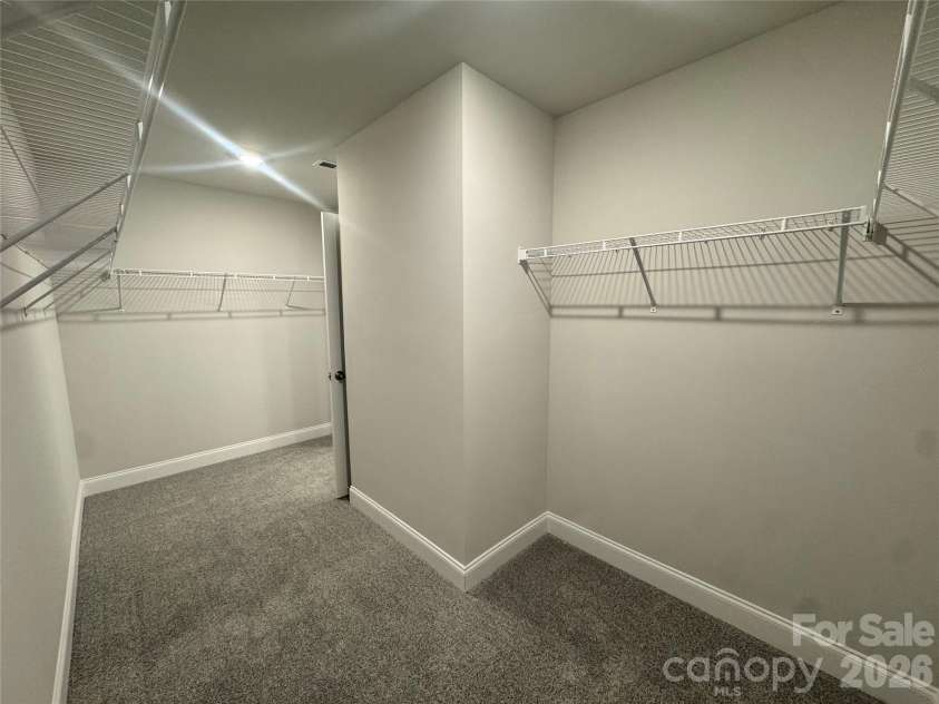 712 Inwood Hill Drive, Gastonia, NC 28056.  MLS# CAR4399206, YatesRealty ID 34440. Oversized walk-in closet  Representative Photo