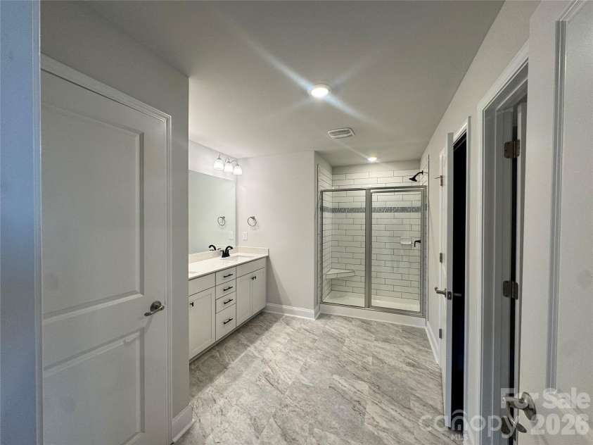 712 Inwood Hill Drive, Gastonia, NC 28056.  MLS# CAR4399206, YatesRealty ID 34440. Primary bathroom  Representative Photo