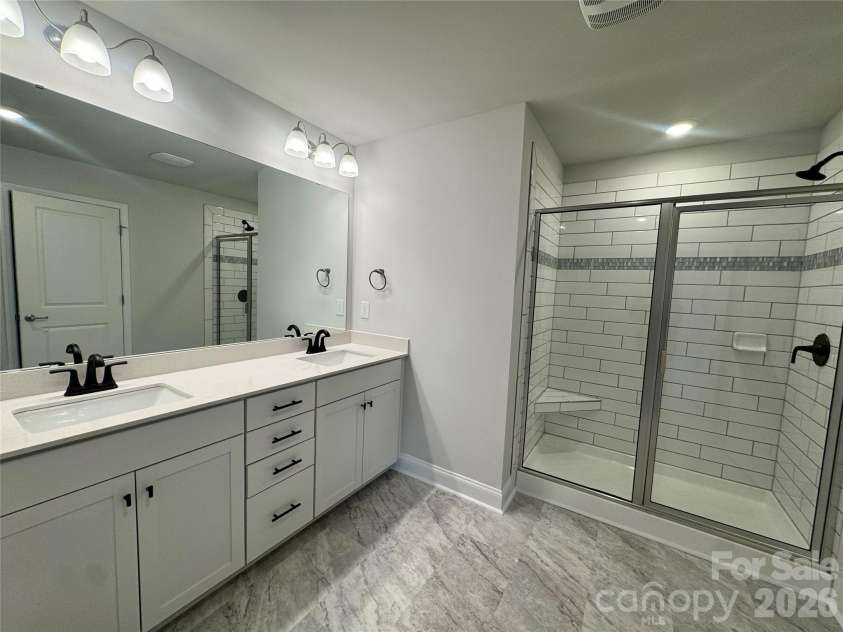 712 Inwood Hill Drive, Gastonia, NC 28056.  MLS# CAR4399206, YatesRealty ID 34440. Primary bathroom  Representative Photo