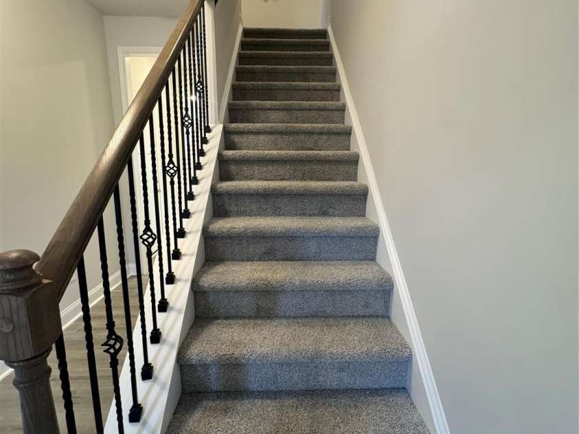 712 Inwood Hill Drive, Gastonia, NC 28056.  MLS# CAR4399206, YatesRealty ID 34440. Staircase  Representative Photo