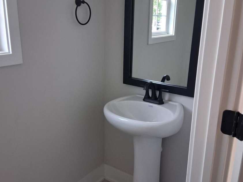 721 Inwood Hill Drive, Gastonia, NC 28056.  MLS# CAR4399183, YatesRealty ID 34441. First Floor Powder Room
