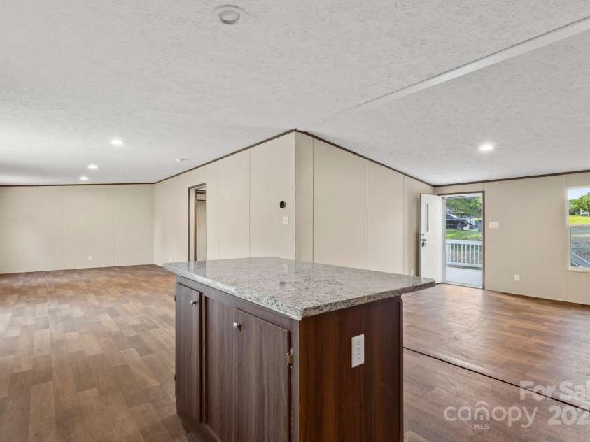 143 Lakewind Drive, Mooresville, NC 28115.  MLS# CAR4236012, YatesRealty ID 34444. 