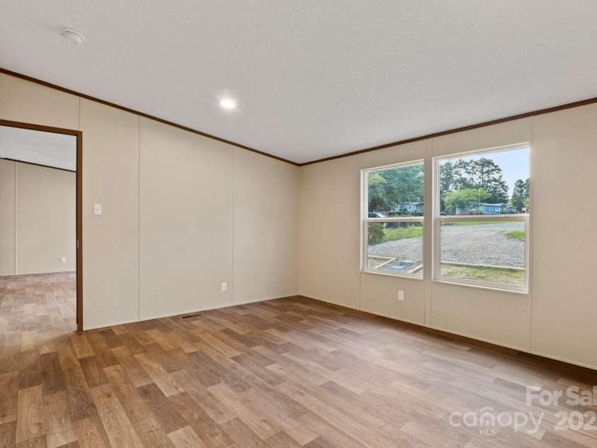 143 Lakewind Drive, Mooresville, NC 28115.  MLS# CAR4236012, YatesRealty ID 34444. 