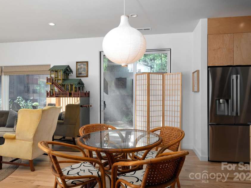26 Winnfred Street, Asheville, NC 28806.  MLS# CAR4293290, YatesRealty ID 34446. Dining Area Off of Kitchen and Back Patio Access