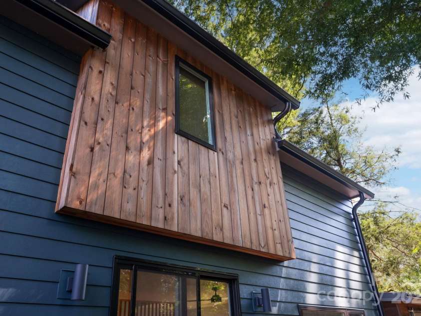 26 Winnfred Street, Asheville, NC 28806.  MLS# CAR4293290, YatesRealty ID 34446. Durable Siding Includes Vertical Stained-Wood Panels