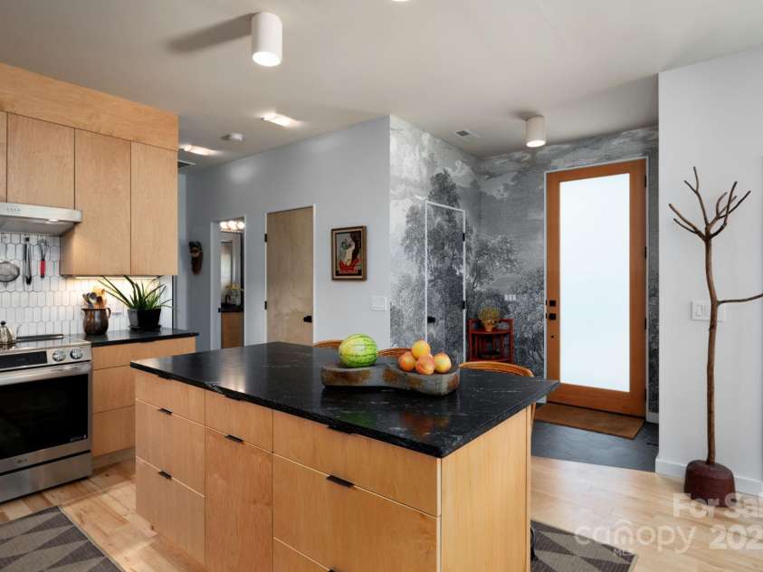 26 Winnfred Street, Asheville, NC 28806.  MLS# CAR4293290, YatesRealty ID 34446. Large Island and Inviting Entry