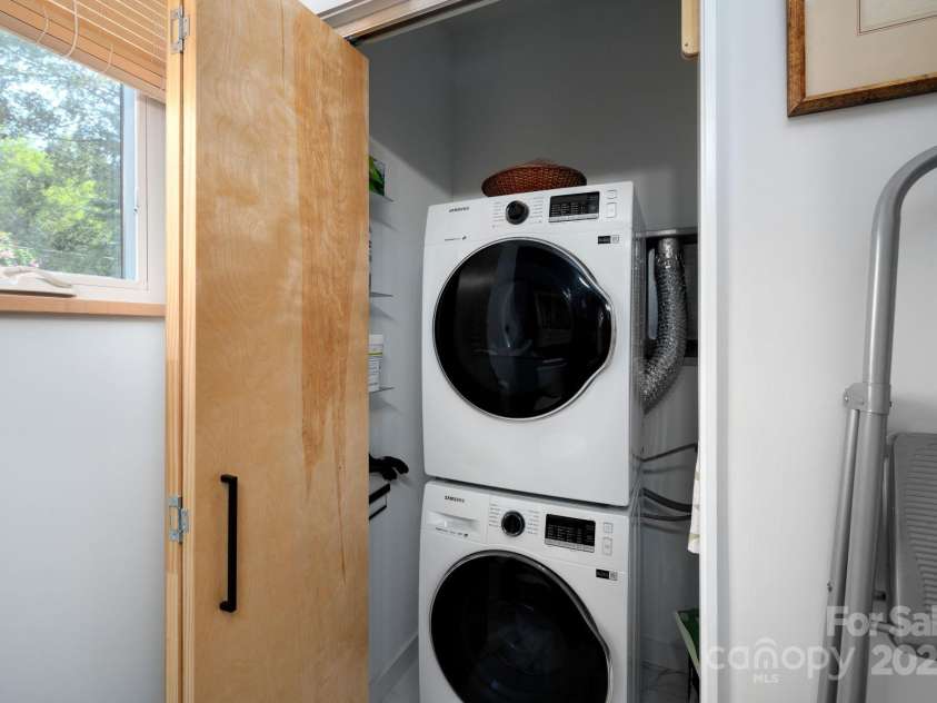 26 Winnfred Street, Asheville, NC 28806.  MLS# CAR4293290, YatesRealty ID 34446. Laundry Closet in Main Level Powder Room