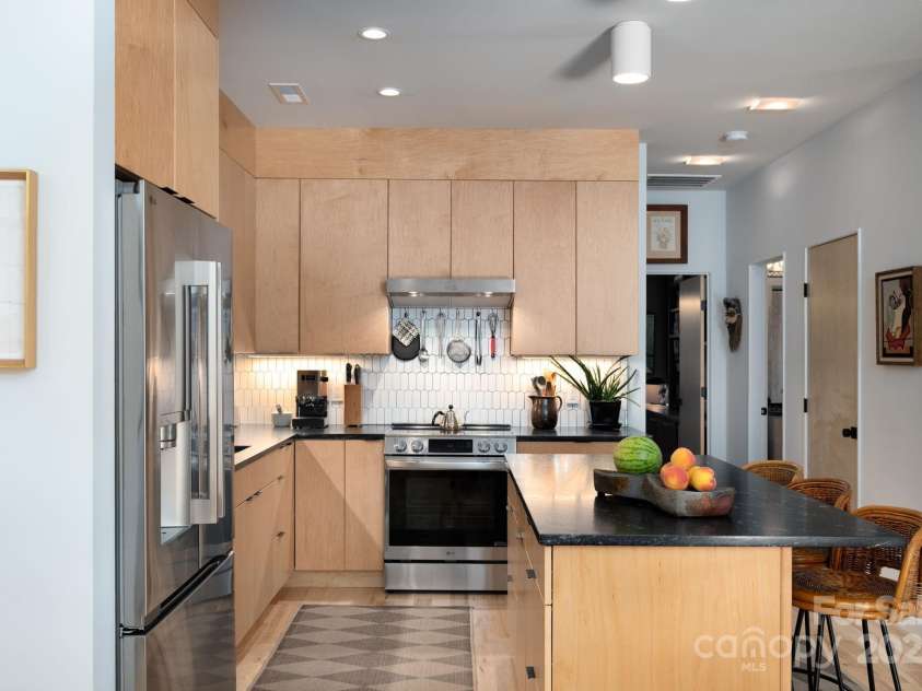 26 Winnfred Street, Asheville, NC 28806.  MLS# CAR4293290, YatesRealty ID 34446. Modern Soft-Close Birch Cabinets