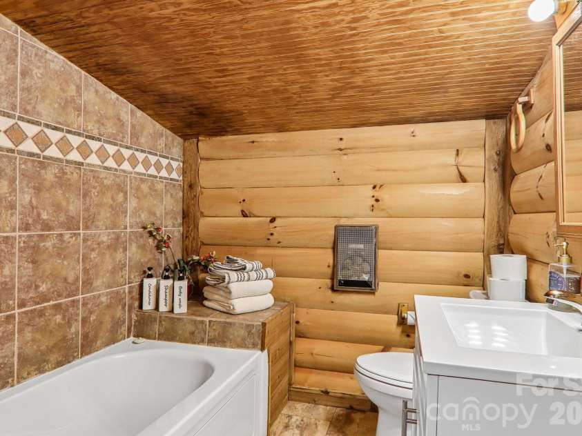 251 Village Lane, Mars Hill, NC 28754.  MLS# CAR4399231, YatesRealty ID 34447. Guest Bath Main Level