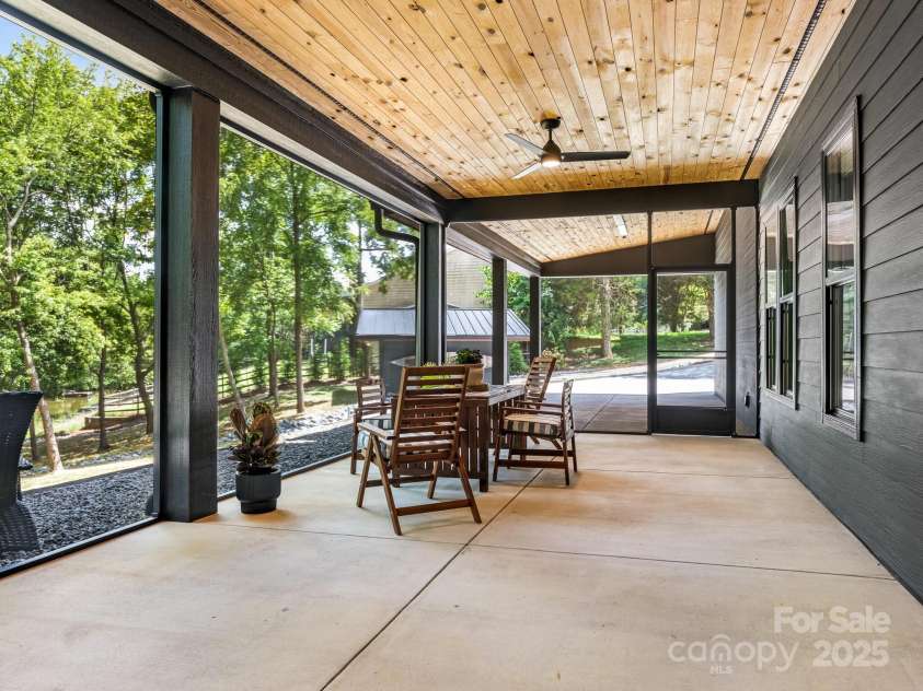 274 Elysian Drive, Mooresville, NC 28117.  MLS# CAR4281477, YatesRealty ID 34448. Lower Screened Porch