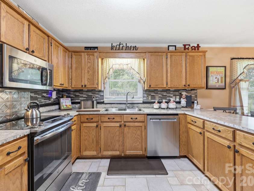 25472 Millingport Road, Locust, NC 28097.  MLS# CAR4351662, YatesRealty ID 34450. 