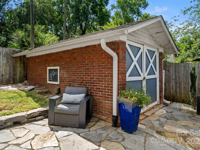 77 Mitchell Avenue, Asheville, NC 28806.  MLS# CAR4285971, YatesRealty ID 34450. Original, detached garage with abundant storage potential.