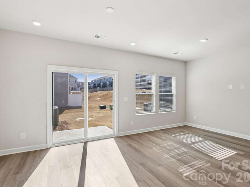 9012 Foggy Brook Loop, Charlotte, NC 28216.  MLS# CAR4399578, YatesRealty ID 34453. Photo is not of the actual home, but is an inspirational photo of builder’s model home and may depict options, furnishings, and/or decorator features that are not included