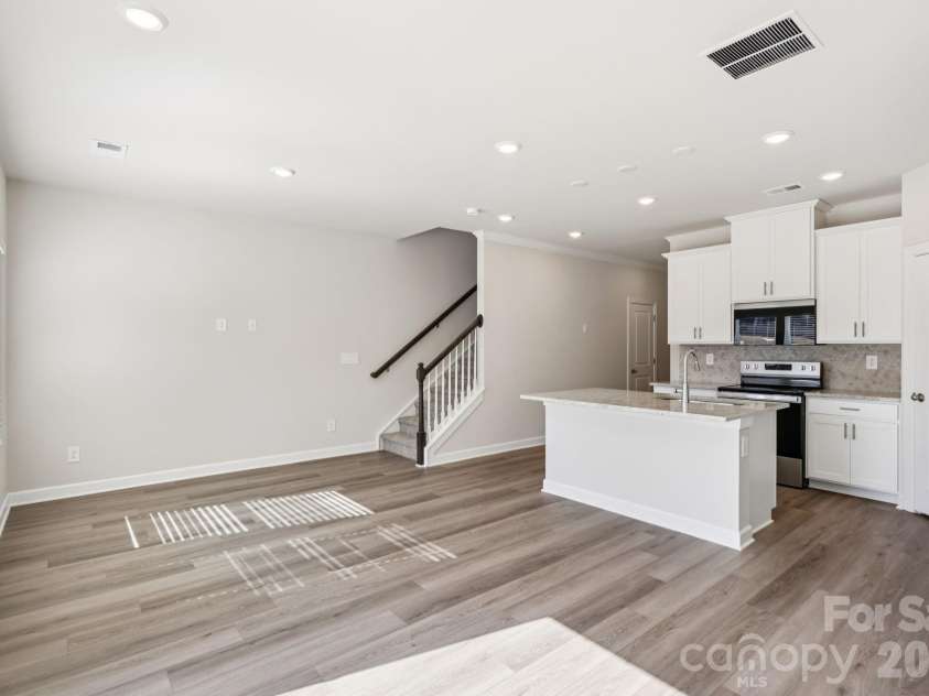 9012 Foggy Brook Loop, Charlotte, NC 28216.  MLS# CAR4399578, YatesRealty ID 34453. Photo is not of the actual home, but is an inspirational photo of builder’s model home and may depict options, furnishings, and/or decorator features that are not included