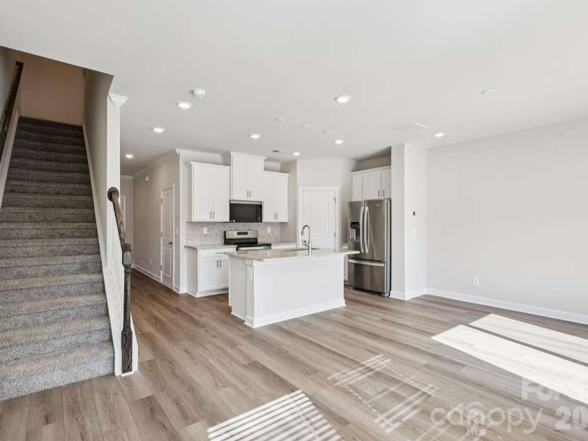9012 Foggy Brook Loop, Charlotte, NC 28216.  MLS# CAR4399578, YatesRealty ID 34453. Photo is not of the actual home, but is an inspirational photo of builder’s model home and may depict options, furnishings, and/or decorator features that are not included