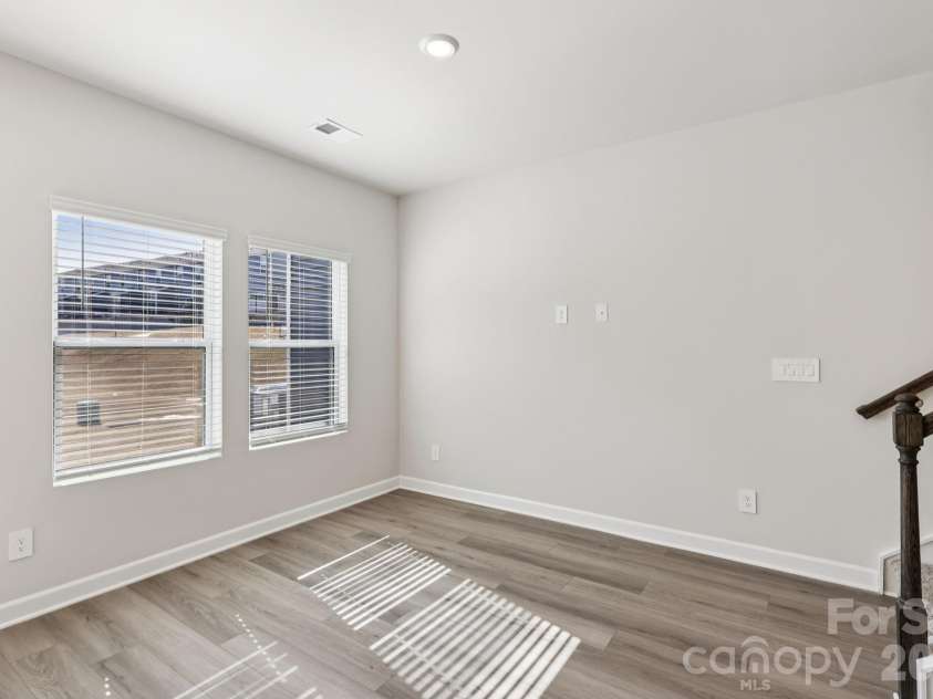 9012 Foggy Brook Loop, Charlotte, NC 28216.  MLS# CAR4399578, YatesRealty ID 34453. Photo is not of the actual home, but is an inspirational photo of builder’s model home and may depict options, furnishings, and/or decorator features that are not included