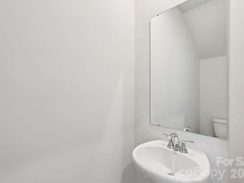 9012 Foggy Brook Loop, Charlotte, NC 28216.  MLS# CAR4399578, YatesRealty ID 34453. Photo is not of the actual home, but is an inspirational photo of builder’s model home and may depict options, furnishings, and/or decorator features that are not included
