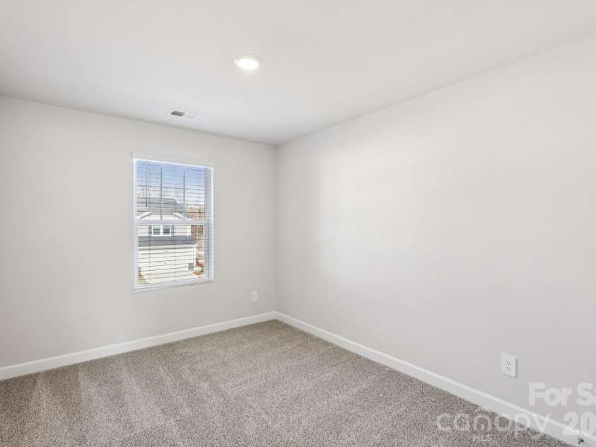 9012 Foggy Brook Loop, Charlotte, NC 28216.  MLS# CAR4399578, YatesRealty ID 34453. Photo is not of the actual home, but is an inspirational photo of builder’s model home and may depict options, furnishings, and/or decorator features that are not included