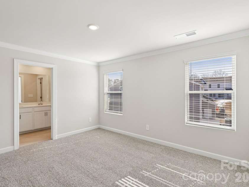 9012 Foggy Brook Loop, Charlotte, NC 28216.  MLS# CAR4399578, YatesRealty ID 34453. Photo is not of the actual home, but is an inspirational photo of builder’s model home and may depict options, furnishings, and/or decorator features that are not included