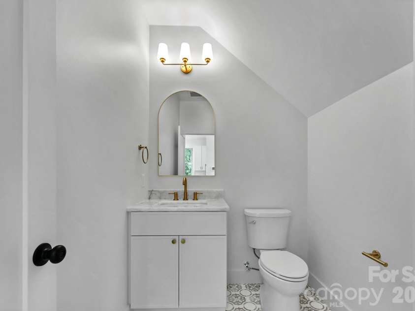 225 Edgewood Road, Asheville, NC 28803.  MLS# CAR4398598, YatesRealty ID 34454. Powder bath