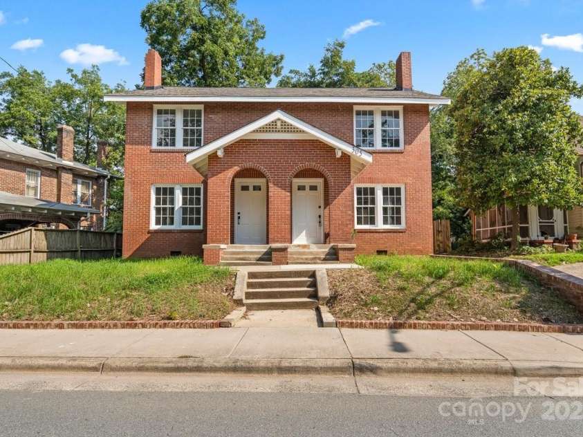 303 Lancaster Avenue, Monroe, NC 28112.  MLS# CAR4287621, YatesRealty ID 34454. Originally built as a duplex for military housing, now updated as a single family home.