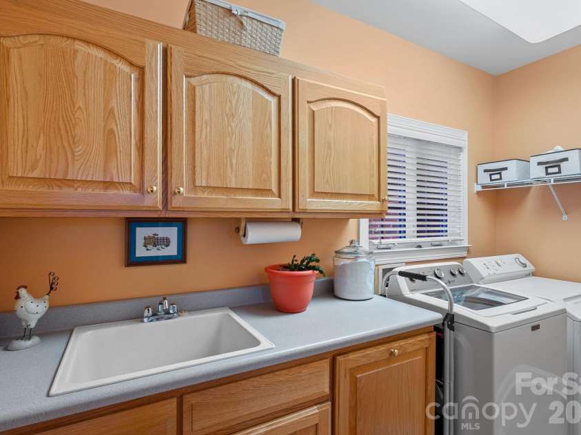 600 Ivah Lee Way, Monroe, NC 28110.  MLS# CAR4293198, YatesRealty ID 3446. Main Level Laundry Room