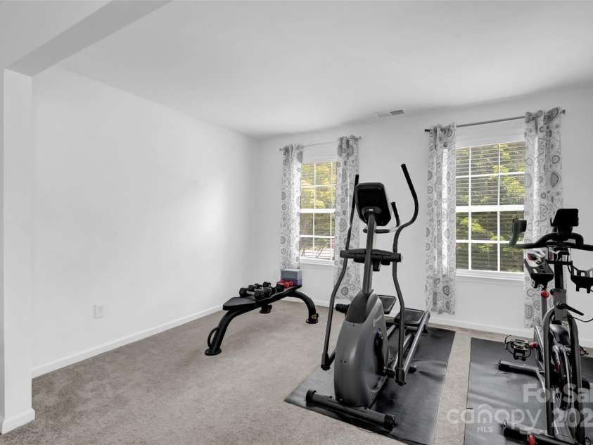 10104 Treetop Lane, Cornelius, NC 28031.  MLS# CAR4274344, YatesRealty ID 34464. Primary Bedroom Sitting Area