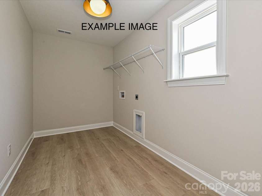 1713 Tabby Drive, Indian Trail, NC 28079.  MLS# CAR4367266, YatesRealty ID 34466. Example Photo - Laundry Room