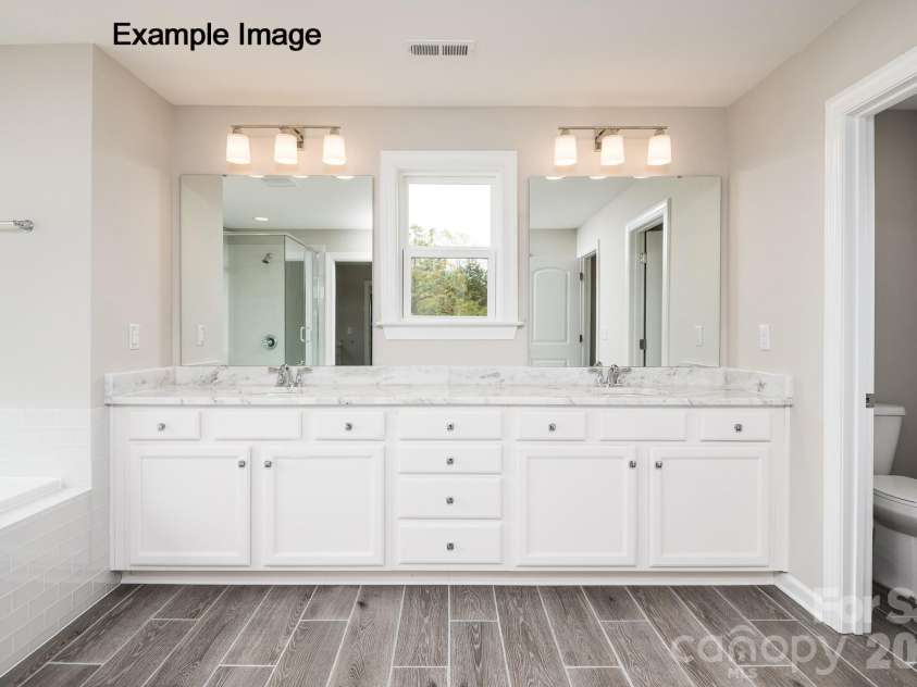 1713 Tabby Drive, Indian Trail, NC 28079.  MLS# CAR4367266, YatesRealty ID 34466. Example Photo - Premier Bath
