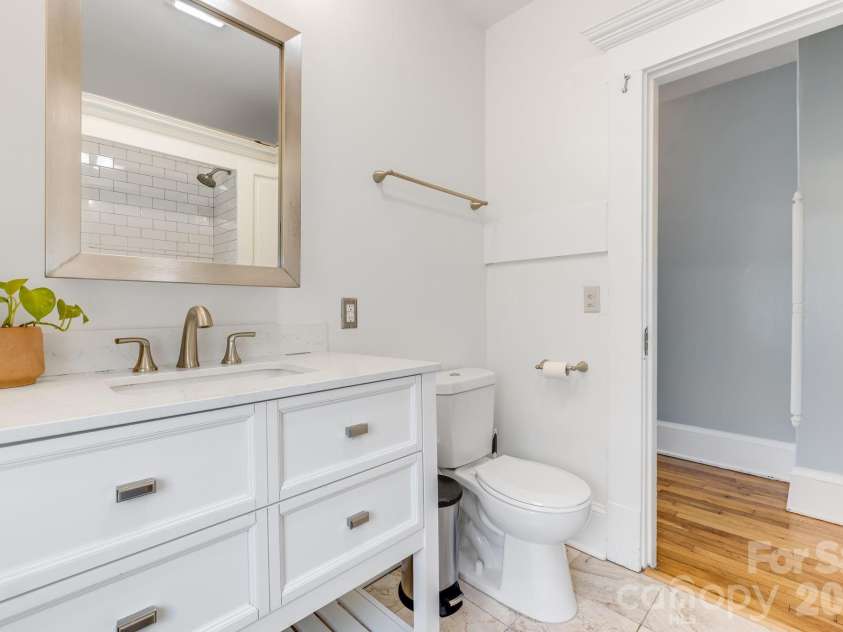 9 Houston Street, Asheville, NC 28801.  MLS# CAR4398917, YatesRealty ID 34469. Upper bathroom
