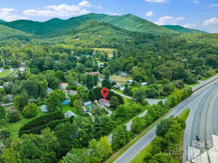 213 Old State Ten Road, Black Mountain, NC 28711.  MLS# CAR4294666, YatesRealty ID 34482. This home offers the best of both worlds—nestled in an established neighborhood with mountain views while also providing quick and convenient access to I-40. Commuting to Asheville, Marion, or surrounding areas