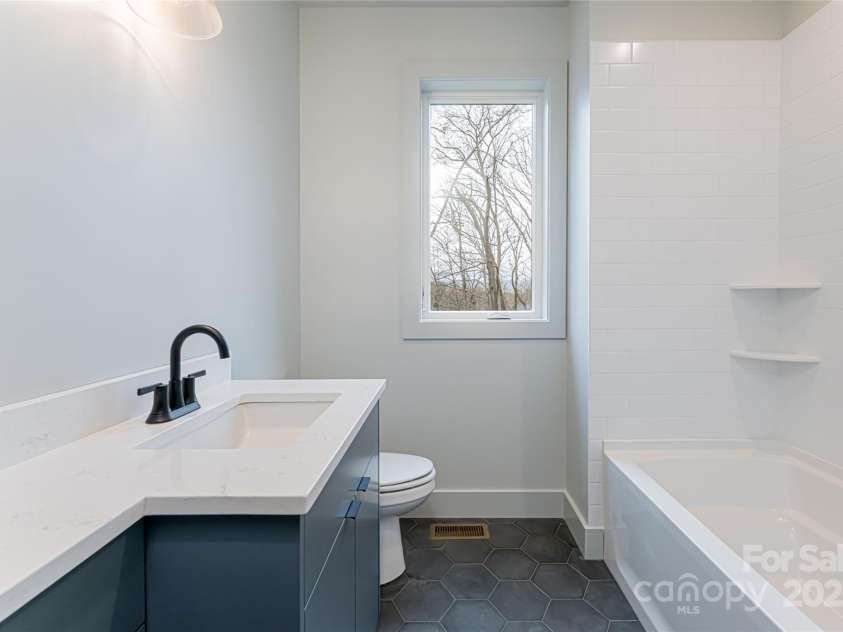 30 Fern Street, Asheville, NC 28803.  MLS# CAR4296373, YatesRealty ID 34486. Photo of Similar Construction