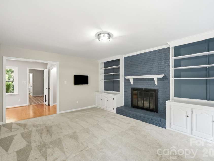 2106 Caleo Circle, Charlotte, NC 28270.  MLS# CAR4397014, YatesRealty ID 34488. Living room with fireplace