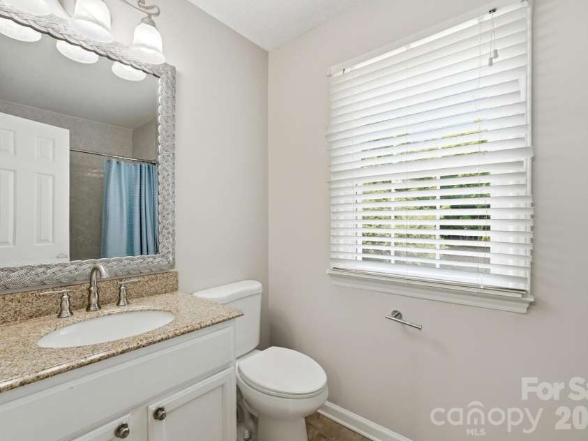 2106 Caleo Circle, Charlotte, NC 28270.  MLS# CAR4397014, YatesRealty ID 34488. Remodeled full bath on 2nd floor